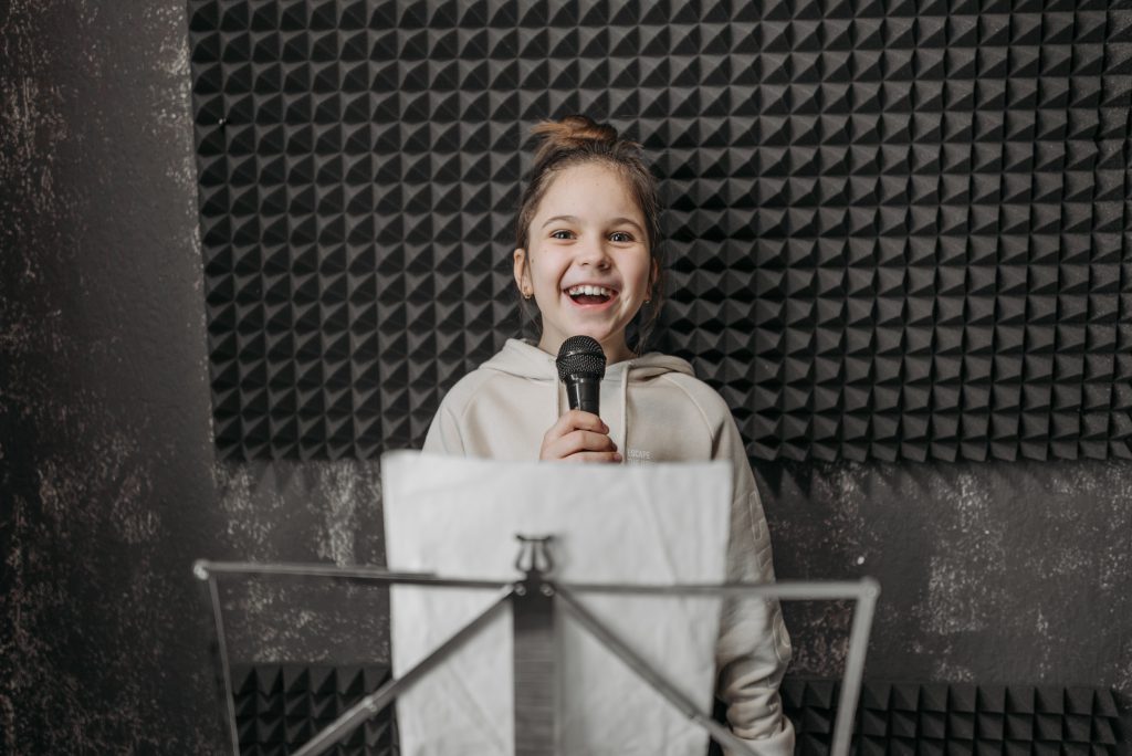 girl in recording booth